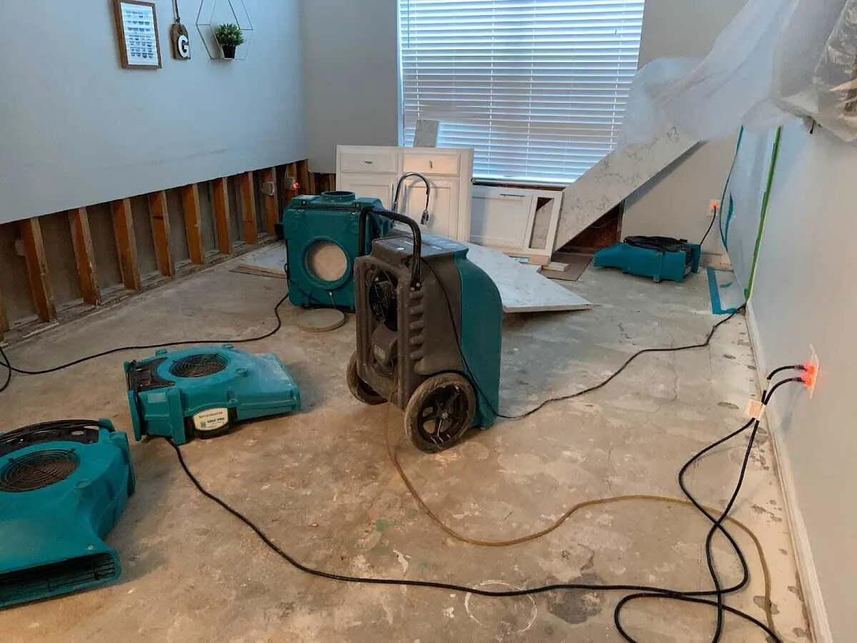 Dehumidifier in flood-cut room for Water Damage Restoration in Millbury